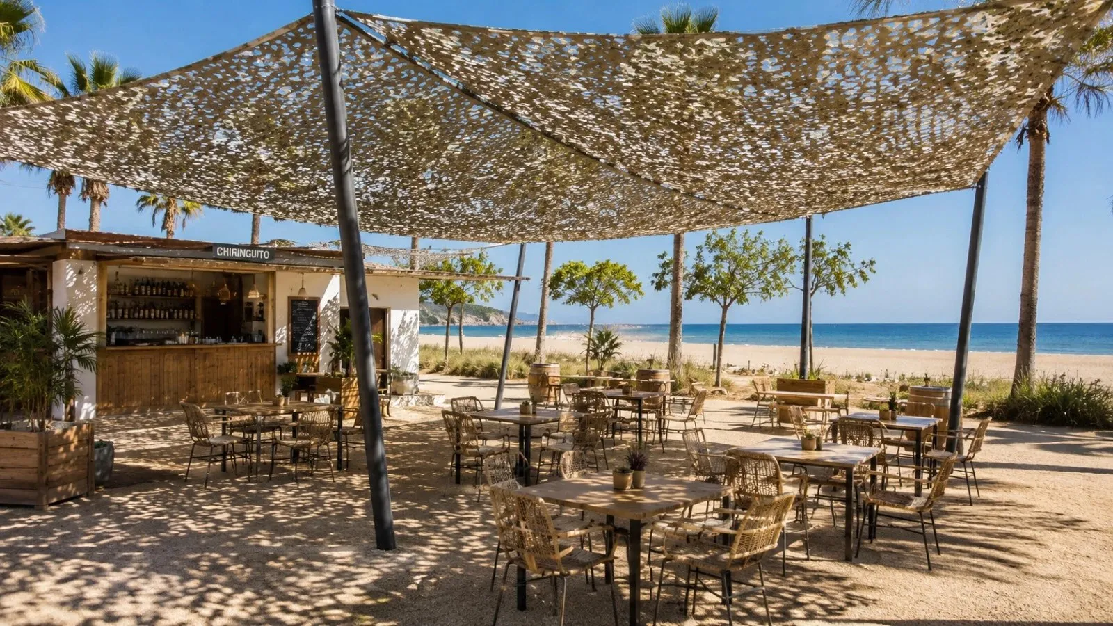 Shade net over a beach bar terrace by the sea